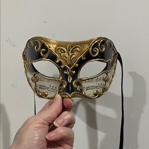 Elegant Gold and Black Masquerade Mask